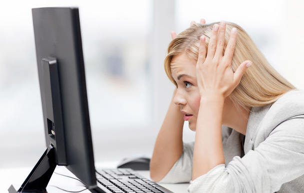 stressed woman with computer - Zdjęcie, obraz