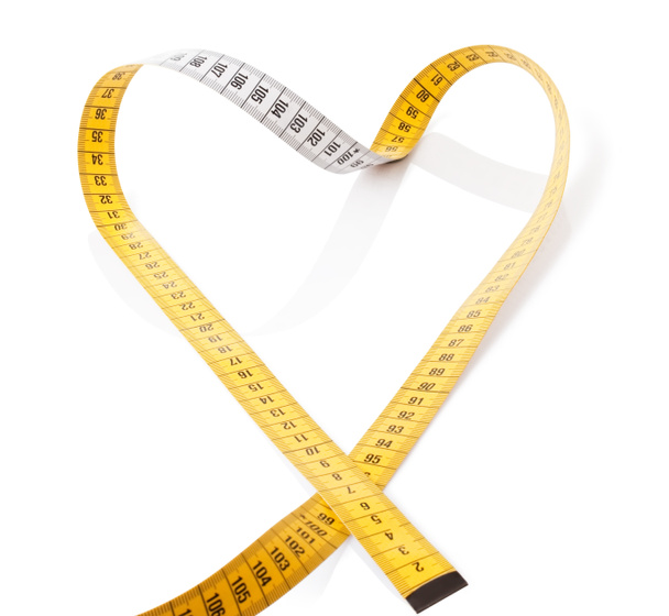 Measuring tape makes heart - Foto, afbeelding