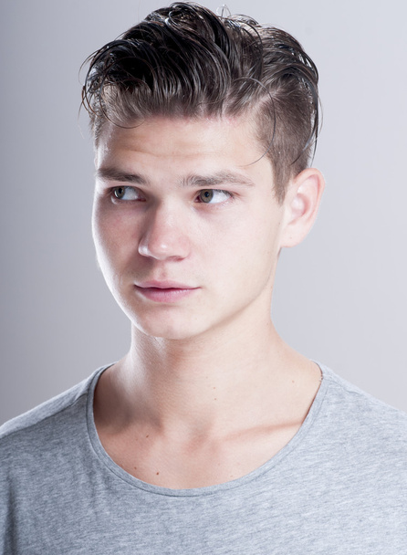 Handsome young man with fashion hairstyle - Fotoğraf, Görsel