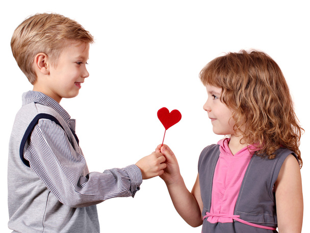 Boy gives a little girl heart - Photo, Image