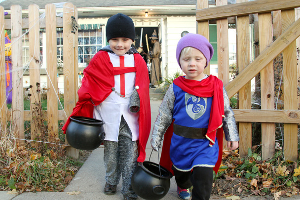 Young Children Leaving House After Trick-or-Treating - Photo, Image