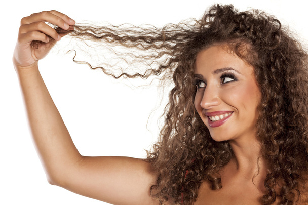 kudrnaté vlasy žena - Fotografie, Obrázek