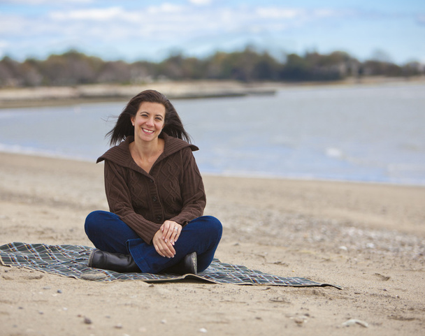 Mujer en la playa
 - Foto, Imagen