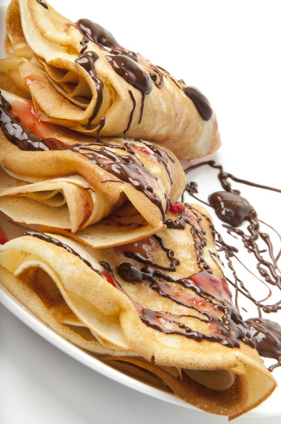 Pancakes with chocolate and strawberry syrup - Fotoğraf, Görsel