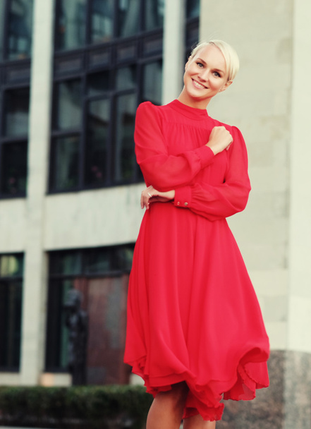 Happy beautiful woman in red summer dress - Foto, Imagen