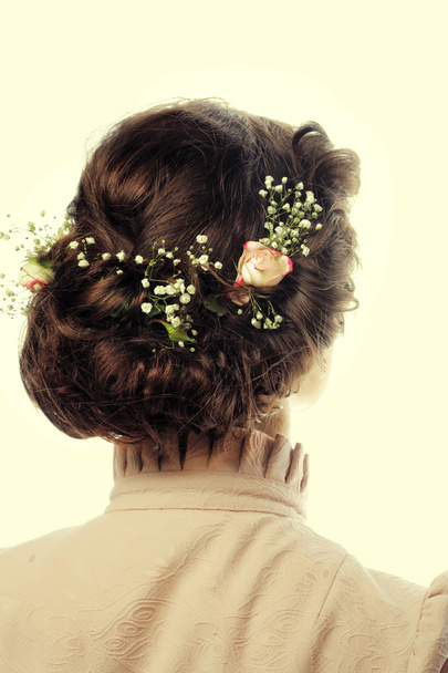 back view of beautiful haircut with small flowers - Φωτογραφία, εικόνα