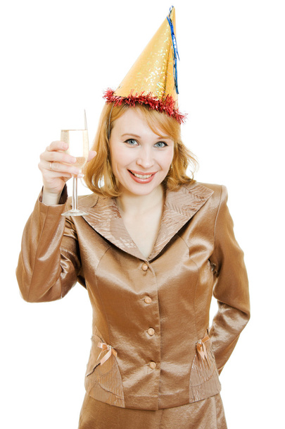 Happy business woman in a festive hat with wine glasses in hand on white ba - Fotoğraf, Görsel