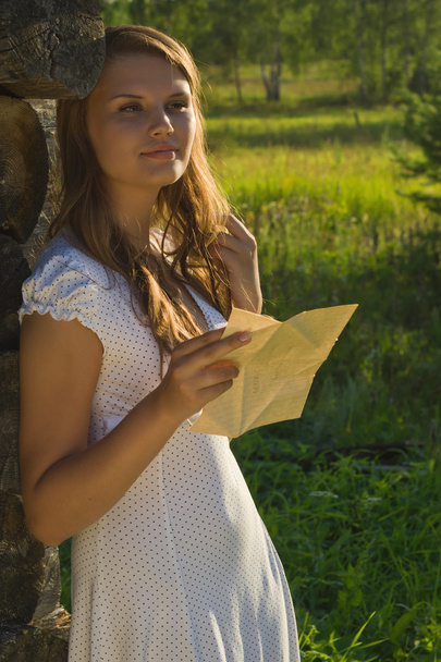 Young russian girl read a letter. - Photo, Image
