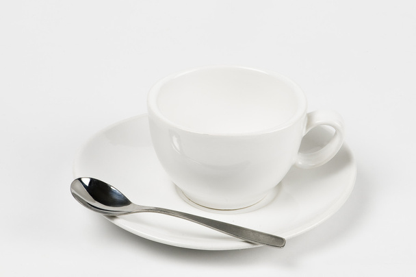 leere Kaffeetassen mit weißer Schüssel und Löffel - Foto, Bild