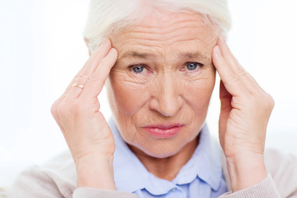 senior woman suffering from headache - Foto, Imagem