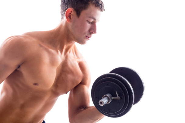 Retrato de un hombre musculoso levantando pesas
 - Foto, Imagen