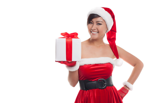 Santa hat Christmas woman holding christmas gifts smiling happy - Zdjęcie, obraz
