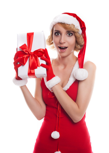 Picture of cheerful santa helper girl with gift box - Foto, imagen