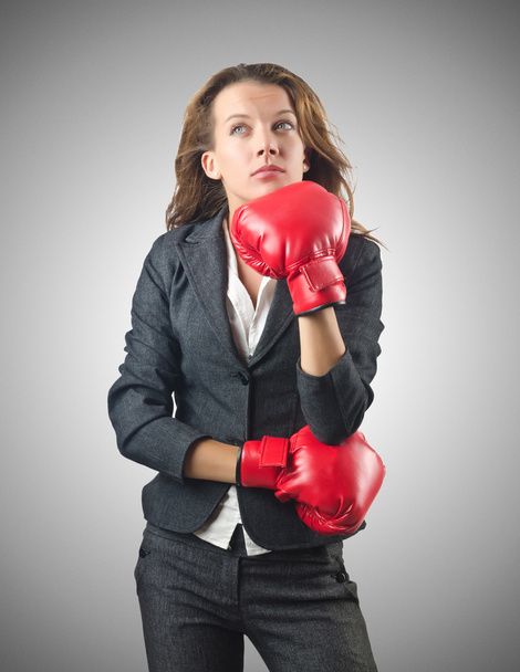 Young businesswoman in boxing concept - Foto, Imagen