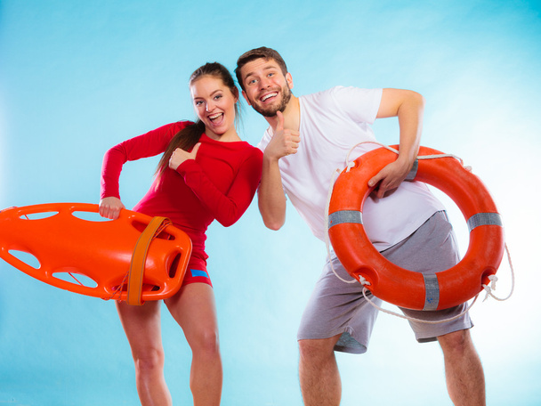 lifeguard couple showing thumbs up - Photo, image