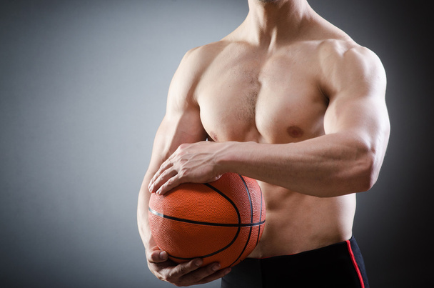 Muscular basketball in sports concept - 写真・画像