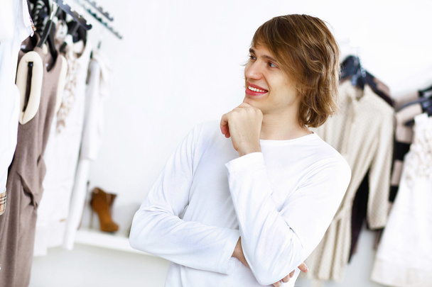 Young man doing shopping - Foto, imagen