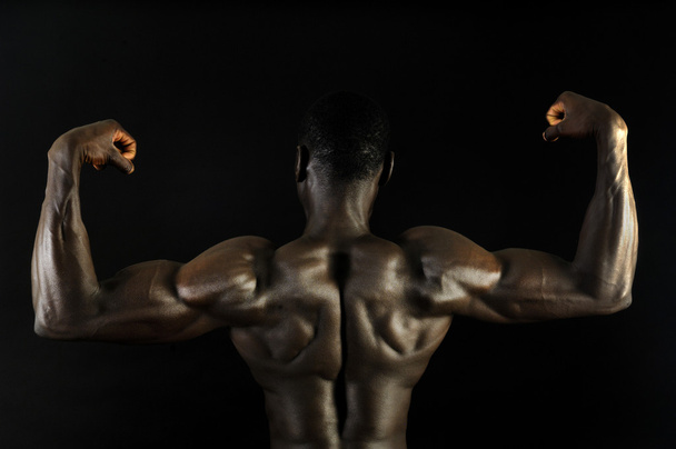 A black man with a muscular body - Foto, Imagem
