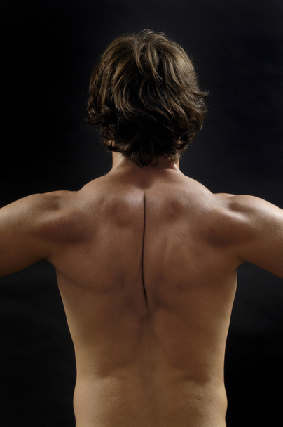 studio photography of a man his back, - Photo, Image
