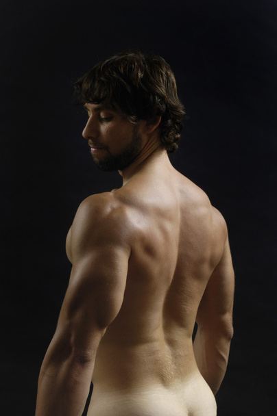 studio photography of a man with His back, - Φωτογραφία, εικόνα