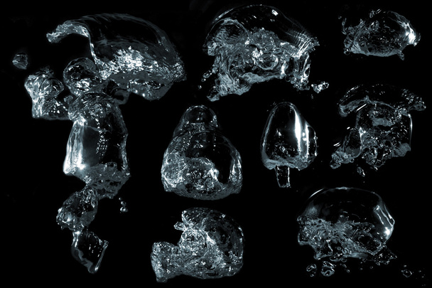 Különböző formájú vízzel buborékok. - Fotó, kép