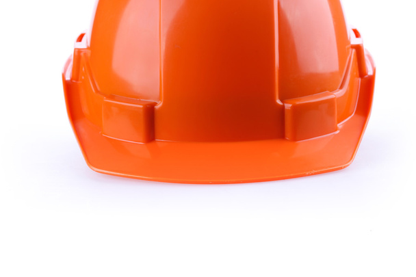 Oranje veiligheid helm harde hoed, hulpmiddel bescherming van werknemer - Foto, afbeelding