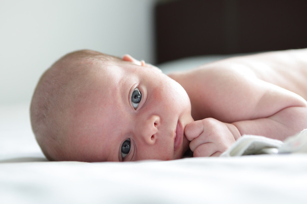 Pensive newborn baby - Fotó, kép