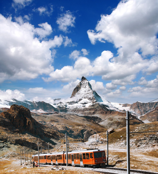 Matterhorn peak with a train in Swiss Alps, Switzerland - Photo, Image