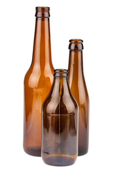 Three empty brown bottles - Fotó, kép