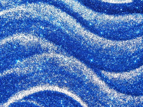 Tummansininen glitter kimallus valkoisella taustalla
 - Valokuva, kuva