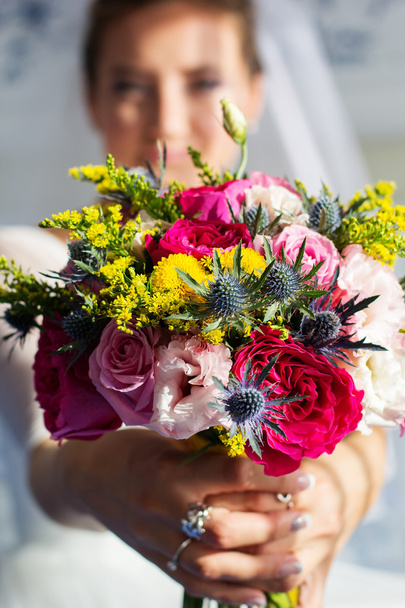 Beautiful wedding bouquet in hands of the bride - Photo, Image