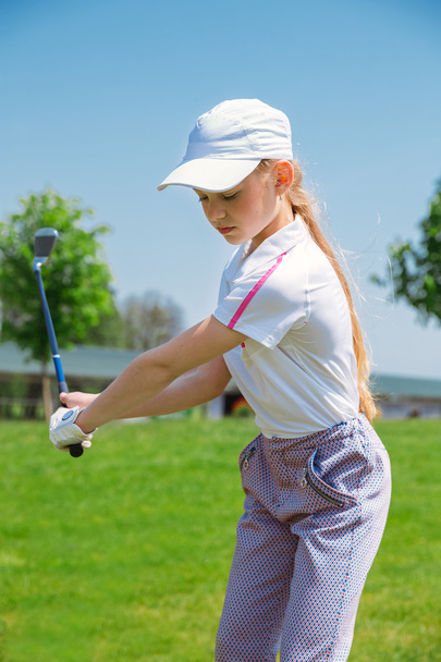 Дівчина грати в гольф
 - Фото, зображення