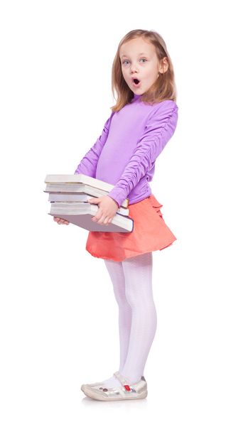 little girl with many books - Photo, Image