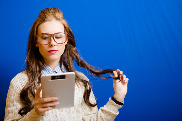Teenager girl with tablet PC - 写真・画像