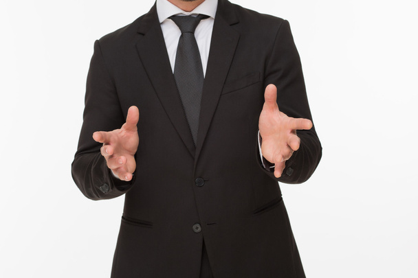Businessman holding hands separately - Фото, изображение
