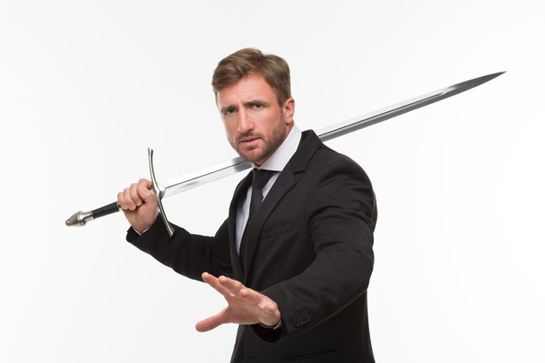 Uomo d'affari con la spada
 - Foto, immagini