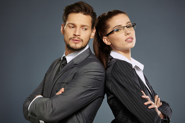 Business couple in suits - Zdjęcie, obraz