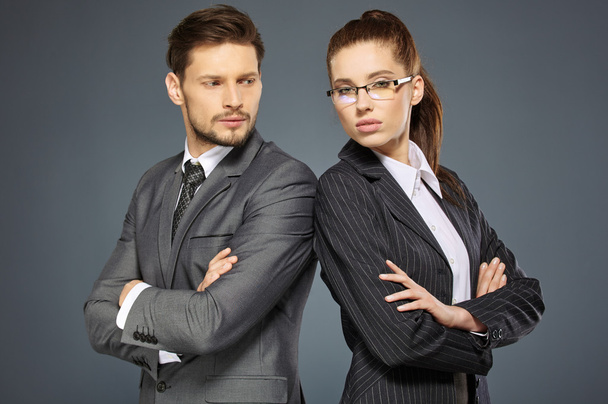 Business couple in suits - Zdjęcie, obraz