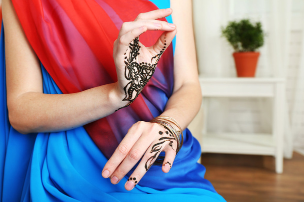 Image of henna on female hands  - Φωτογραφία, εικόνα