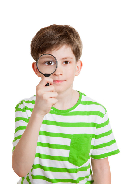 boy holds loupe - Foto, afbeelding