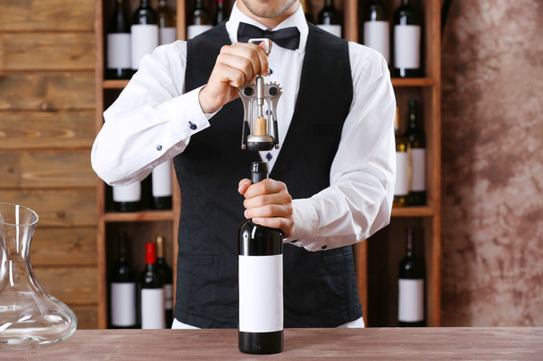 Bartender working at counter   - Foto, Imagen
