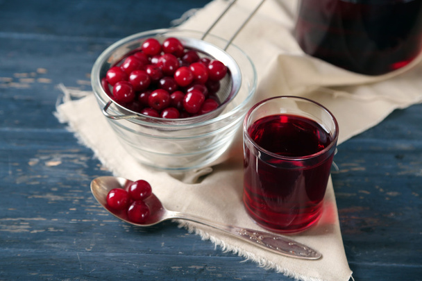 cherry juice on table - Foto, Imagem