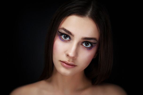 Portrait of beautiful young woman - Photo, Image