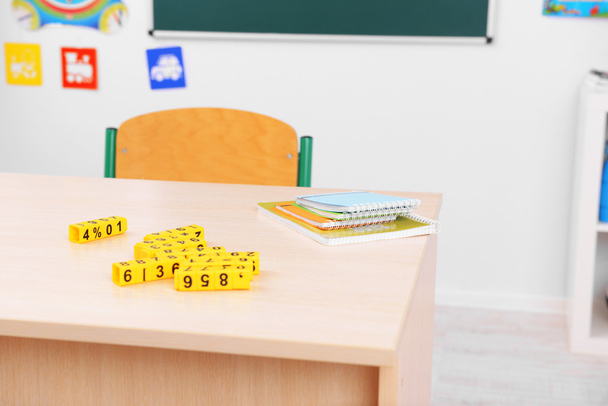 School desk with plastic cubes - Foto, imagen