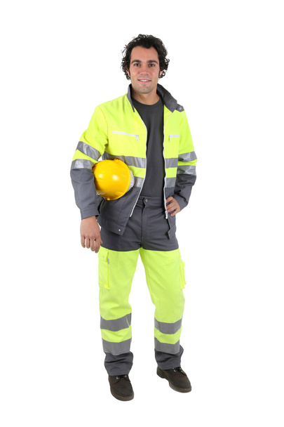 Man wearing a high visibility suit - Фото, изображение