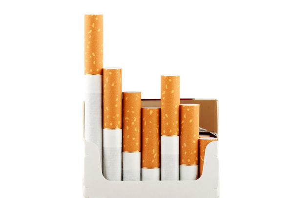 Cigarettes in pack on the white - Foto, Imagen