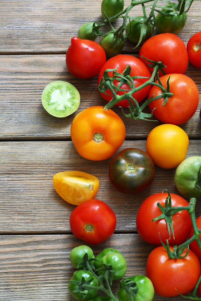 fresh tomatoes on boards - Фото, изображение