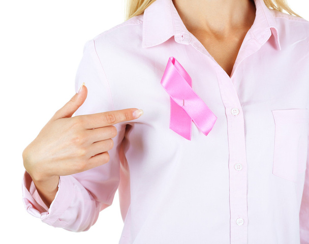 Woman using pink ribbon on her chest - Fotoğraf, Görsel