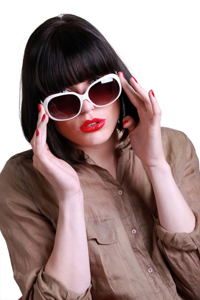 Attractive brunette wearing sunglasses - Фото, зображення