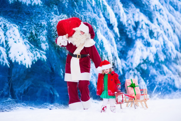 Kids and Santa with Christmas presents - Foto, Imagen